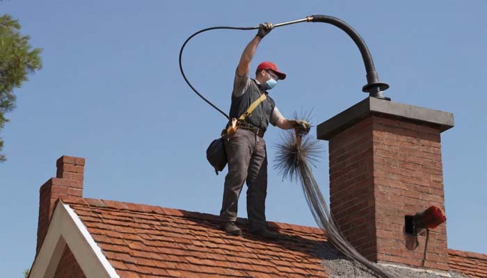Before and after comparison of cleaned brick chimney in prowers county co